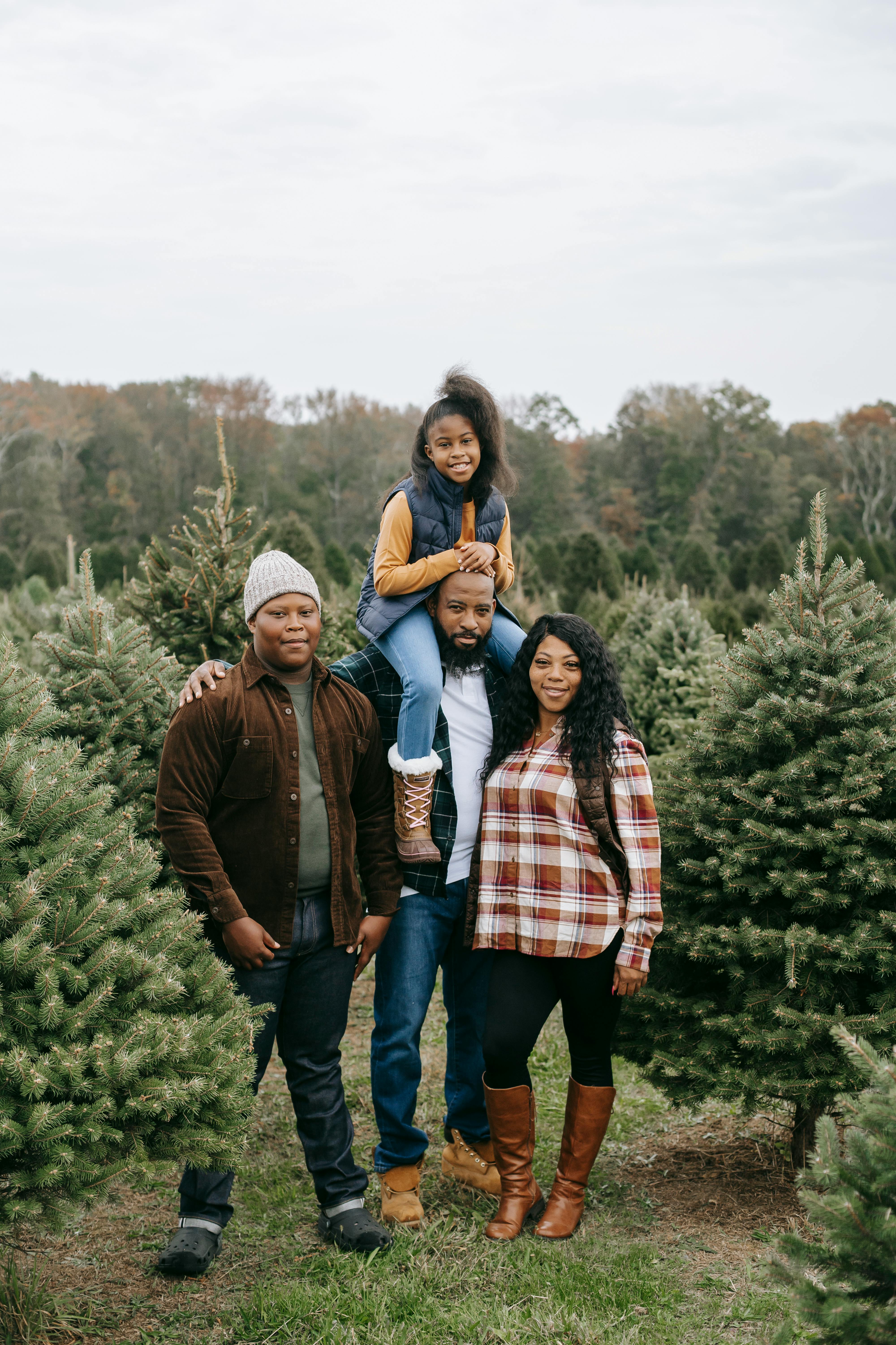 Family of four enjoying outdoor time together